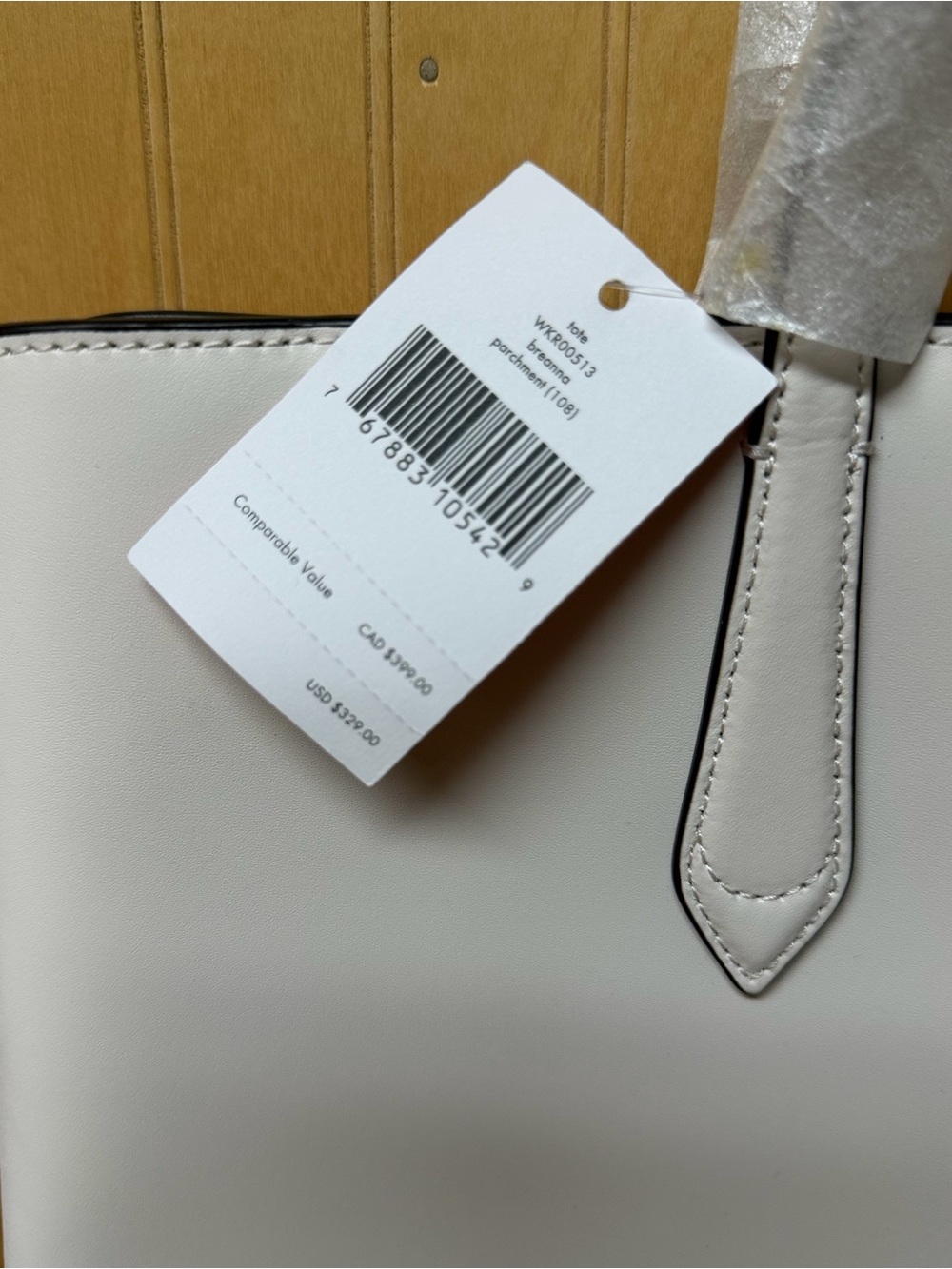 NWT Kate Spade New York White Leather Tote Bag with Orange Charm - Picture 4 of 7